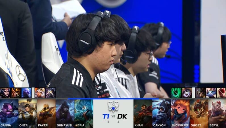 A screenshot from the 2021 World Championship Main Event Semifinals broadcast, showing the Game Five champion drafts between DAMWON KIA and T1 with a shot of the DWG Kia LoL roster on stage above.